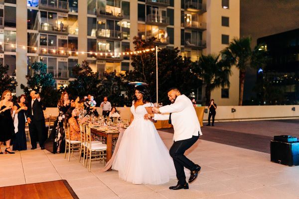 Downtown Gold and Greenery Balcony Wedding - A Chair Affair, Inc.