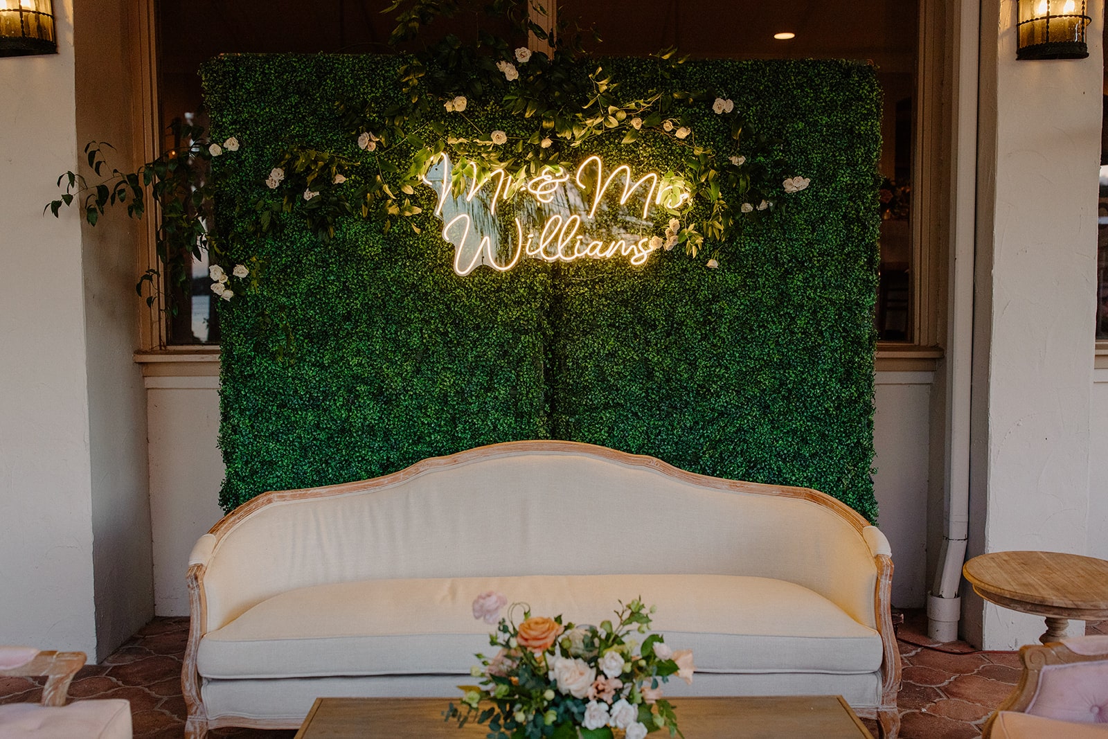 A Chair Affair hedge walls photobooth elegant floral wedding