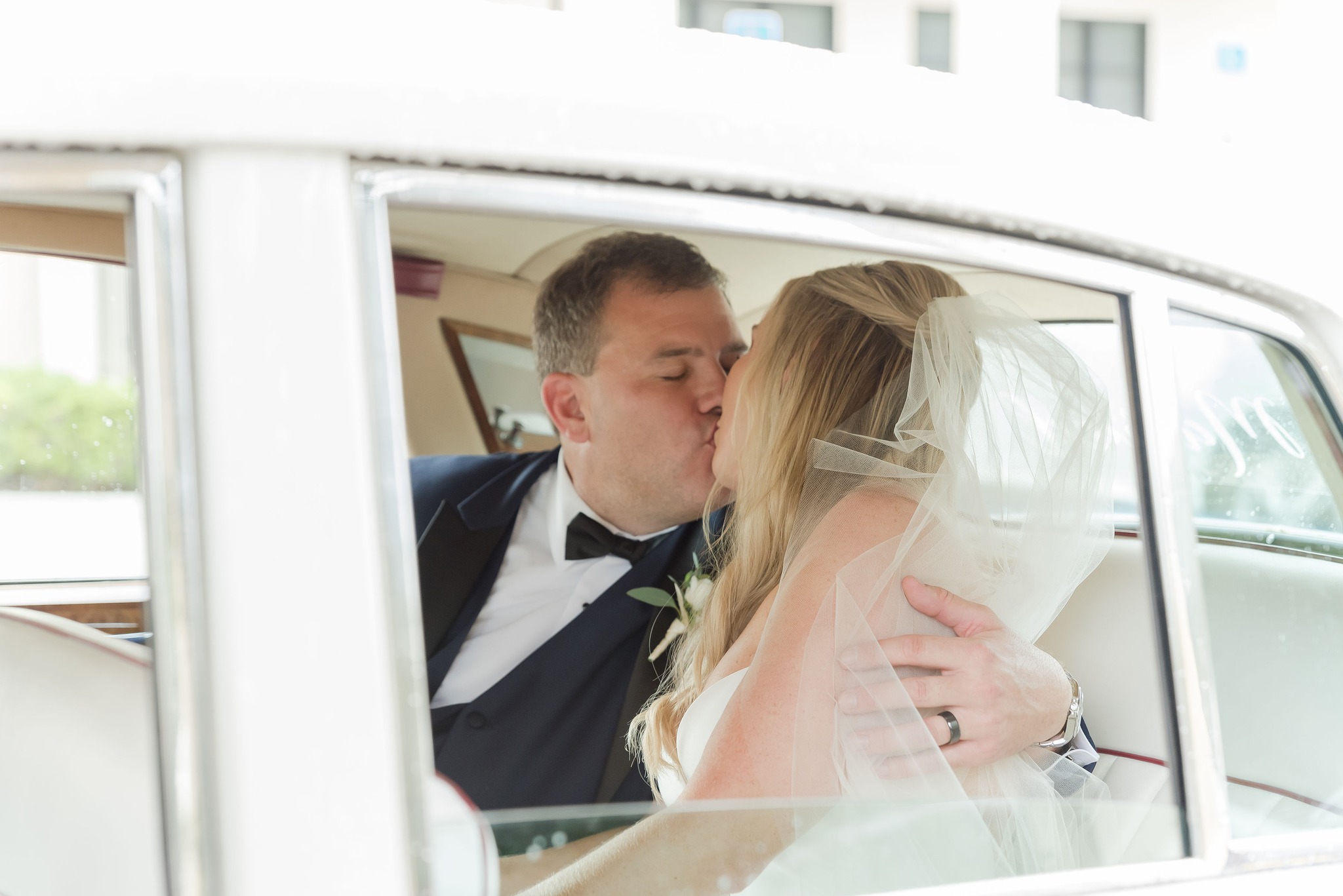 Newlyweds Kissing In The Car