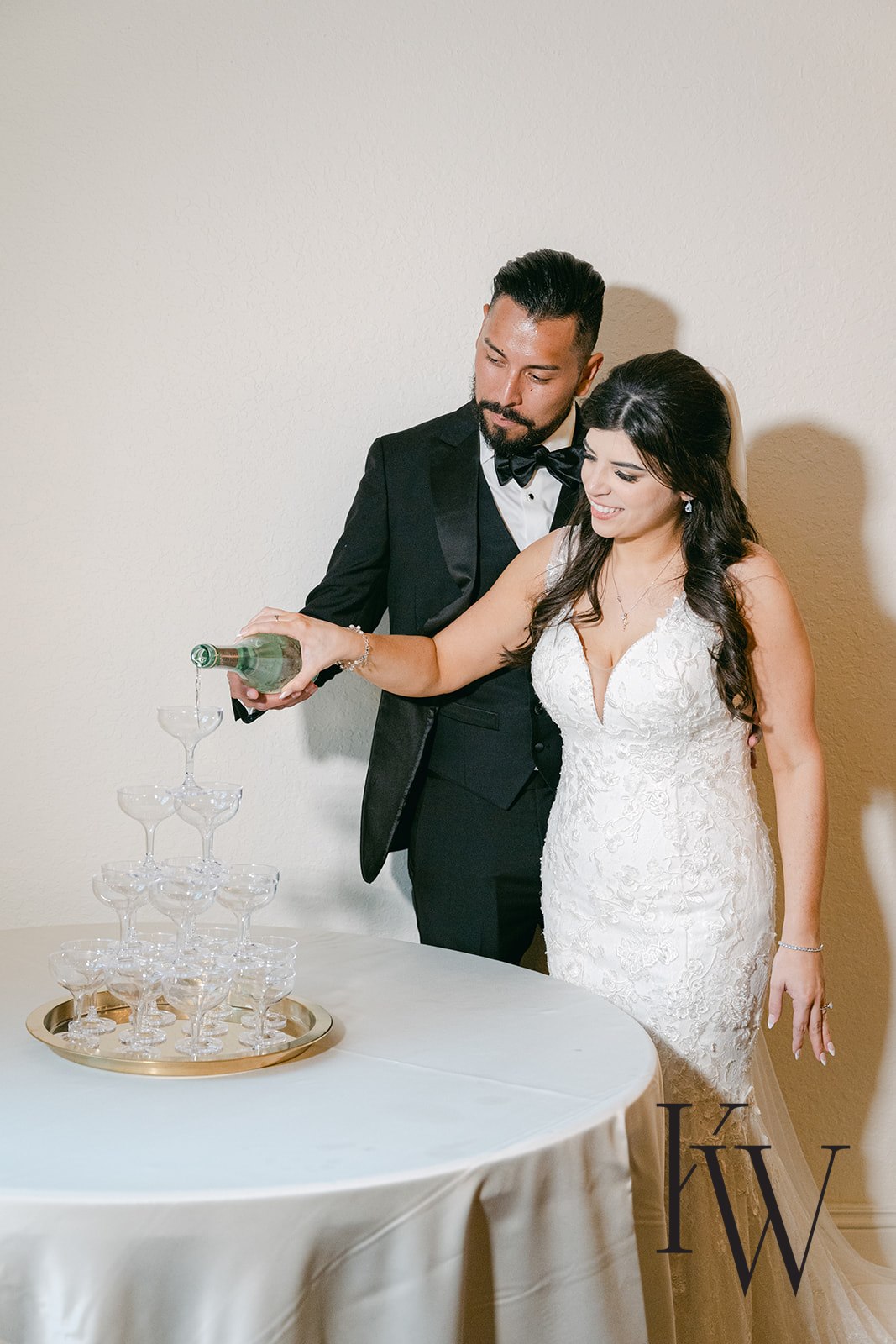 The-Newlyweds-Pouring-Champagne-Tower