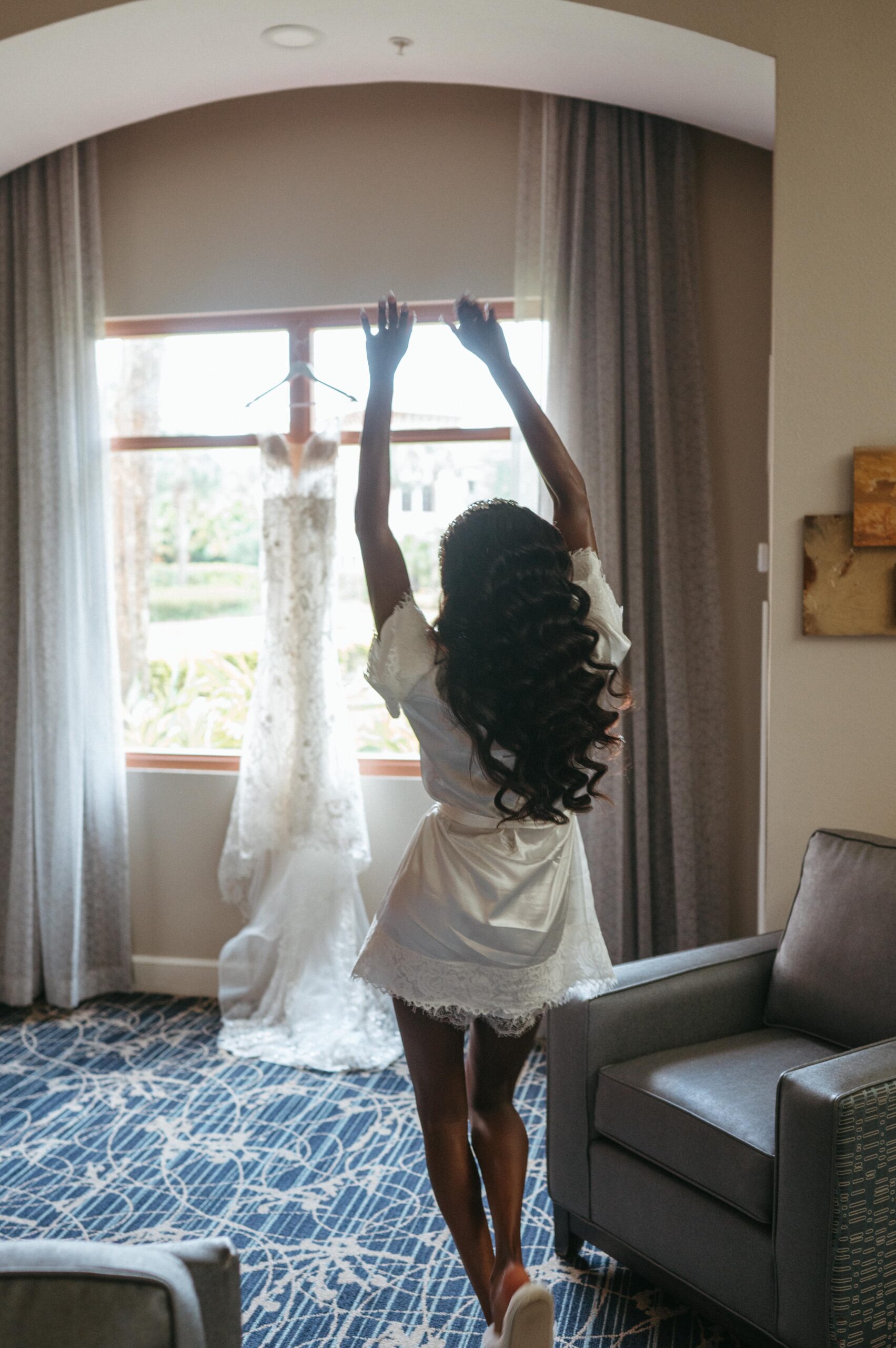 Bride-Admiring-Dress
