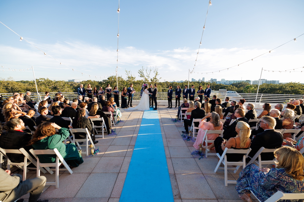 light blue carpet runner ceremony bride and groom
