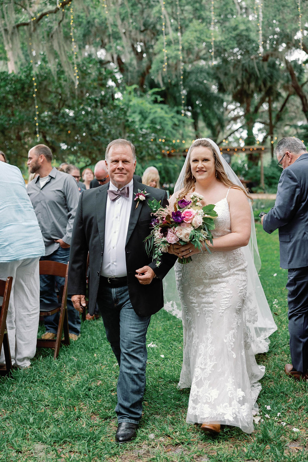 Ashley and her father walking down the aisle