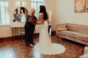 A bride getting ready at the Powel Crosley Estate for her big day.