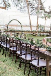 Wedding rentals New Smyrna supplied the Mahogany Chiavari Chairs and White Pads