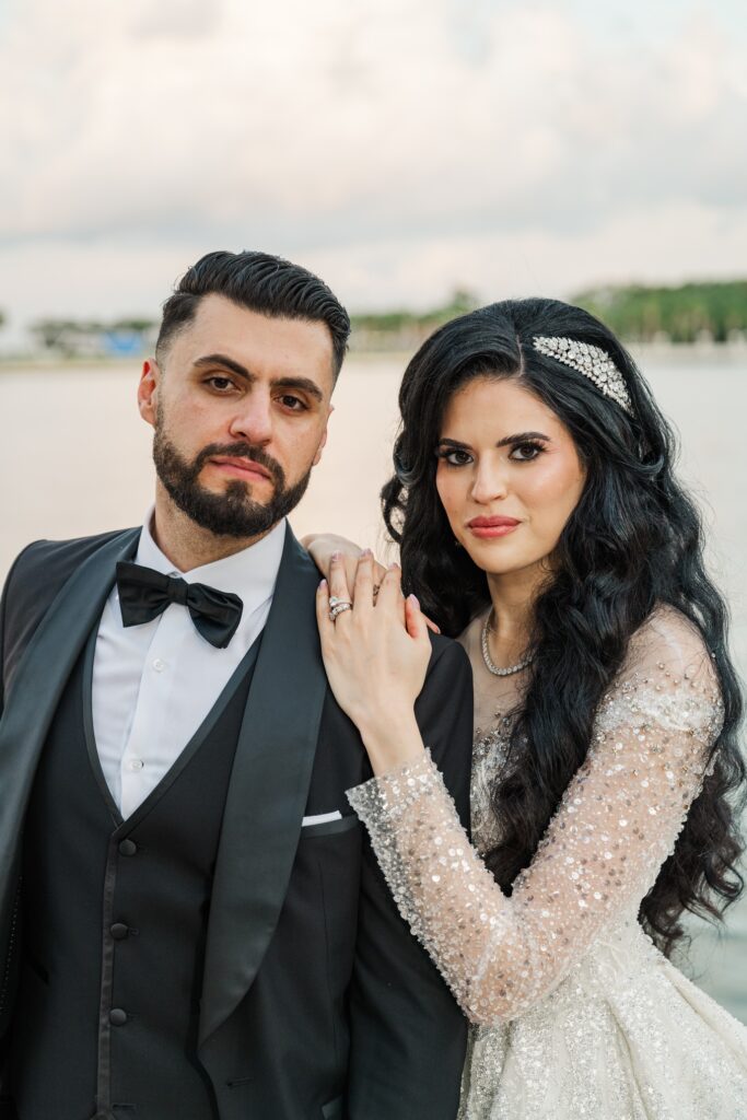 An Elegant Wedding at The Vinoy with bride holding the grooms shoulder