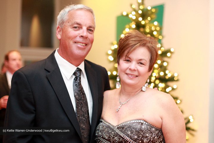 Ann Taylor the founder of A Chair Affair with her husband. Orlando Wedding Rentals. The Genesis of Glamour: How A Chair Affair Sparked a Revolution in Orlando Events