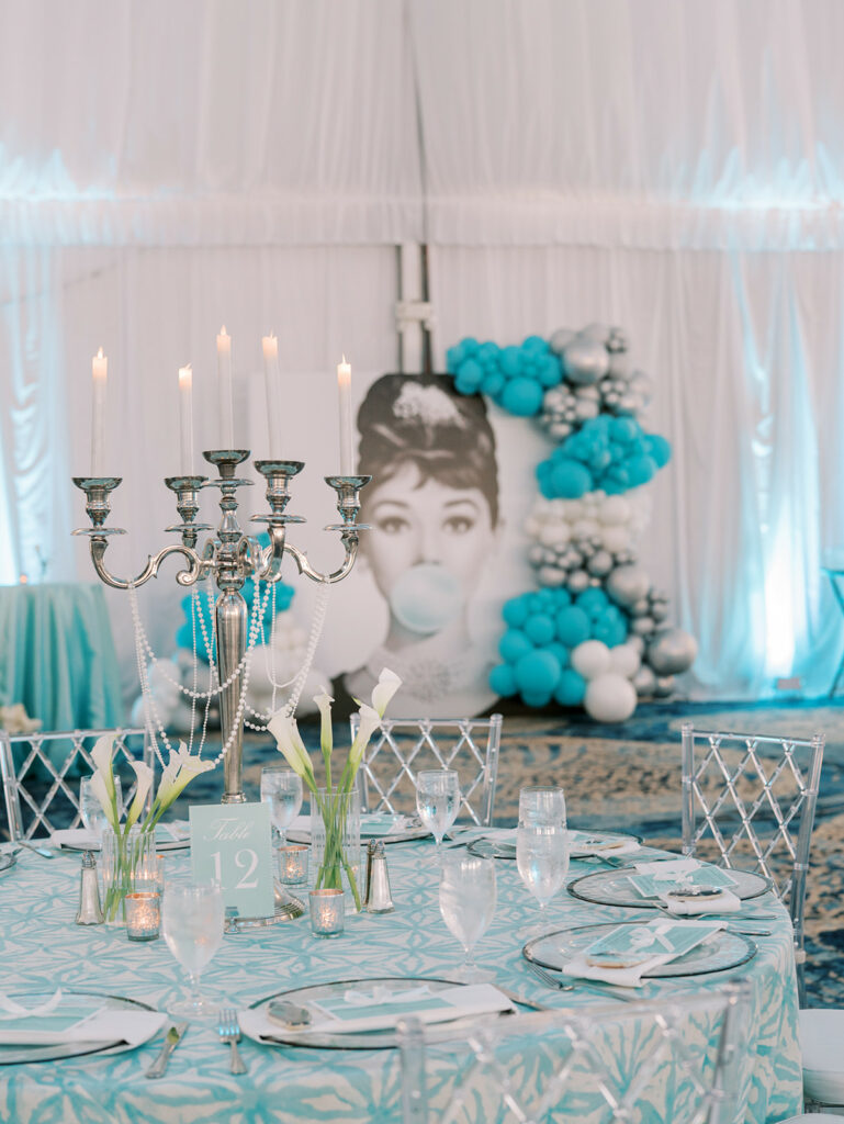 Table with backdrop view of Breakfast at Tiffany's Speed Networking Event. Breakfast at Tiffany's: A Networking Event That Shines Orlando Wedding Rentals. Tampa Wedding Rentals