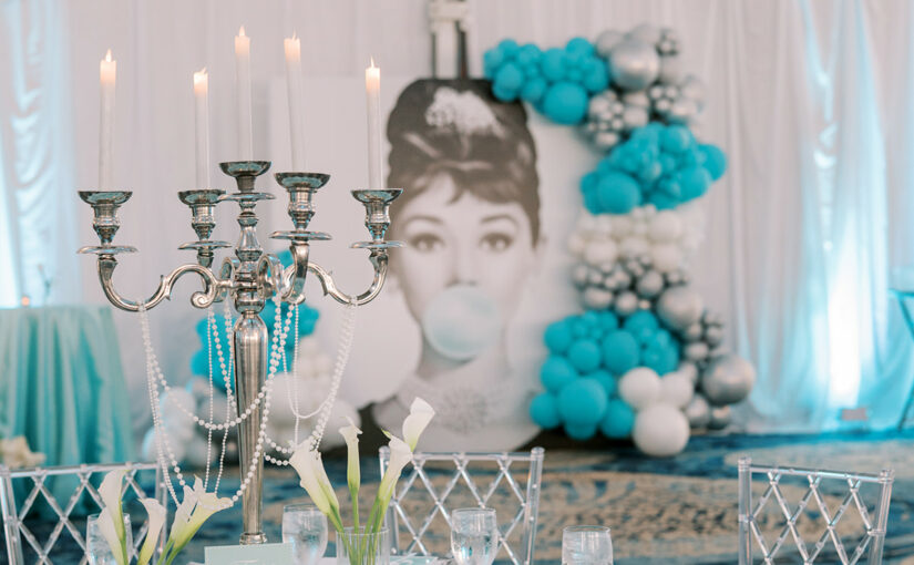 Table with backdrop view of Breakfast at Tiffany's Speed Networking Event. Breakfast at Tiffany's: A Networking Event That Shines Orlando Wedding Rentals. Tampa Wedding Rentals