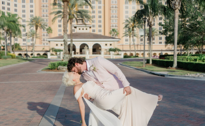 Bride and Groom at Rosen Shingle Creek. Orlando Wedding Rentals. A Chair Affair Rentls.