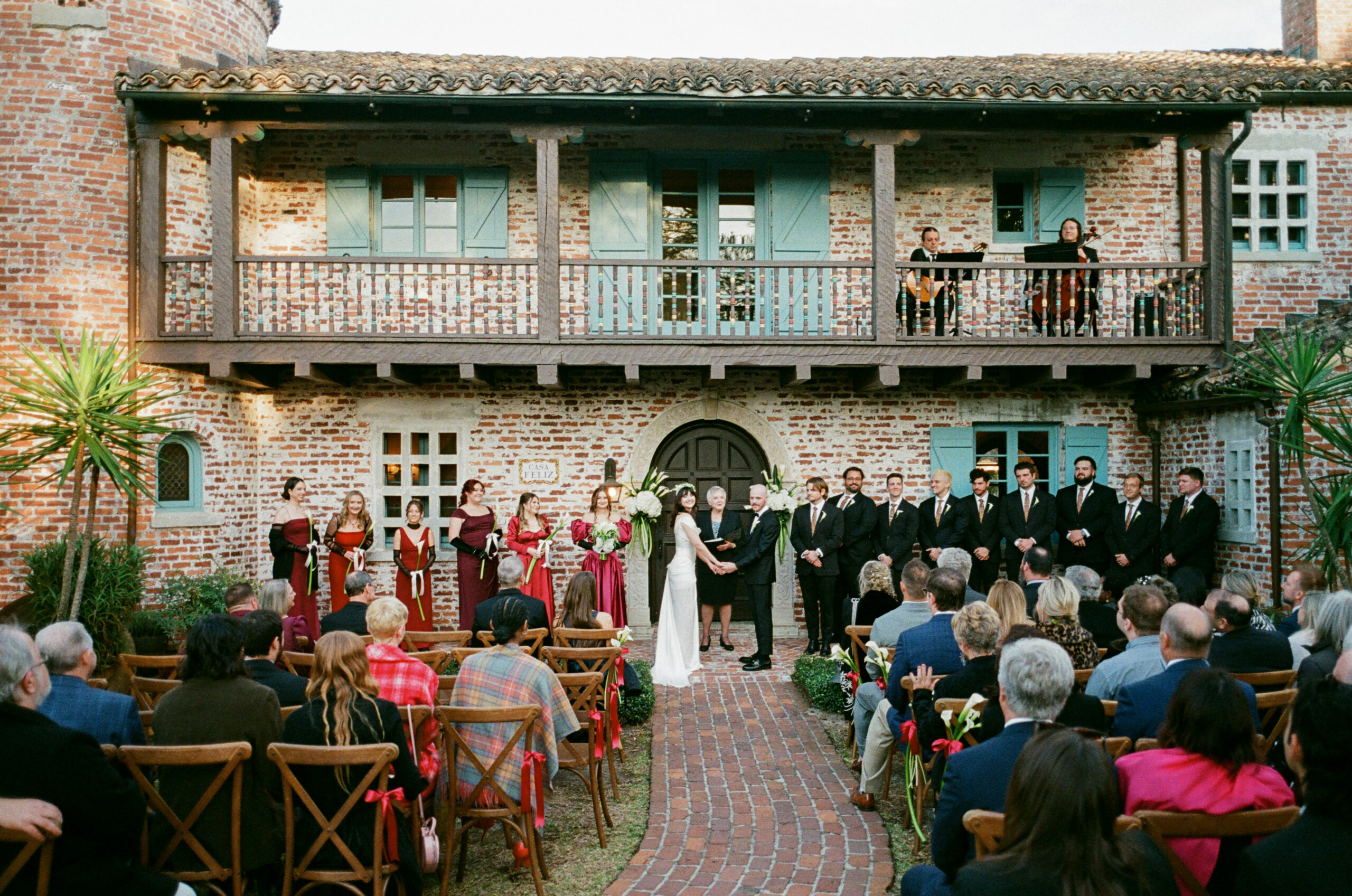 View of ceremony with musicians on balcony