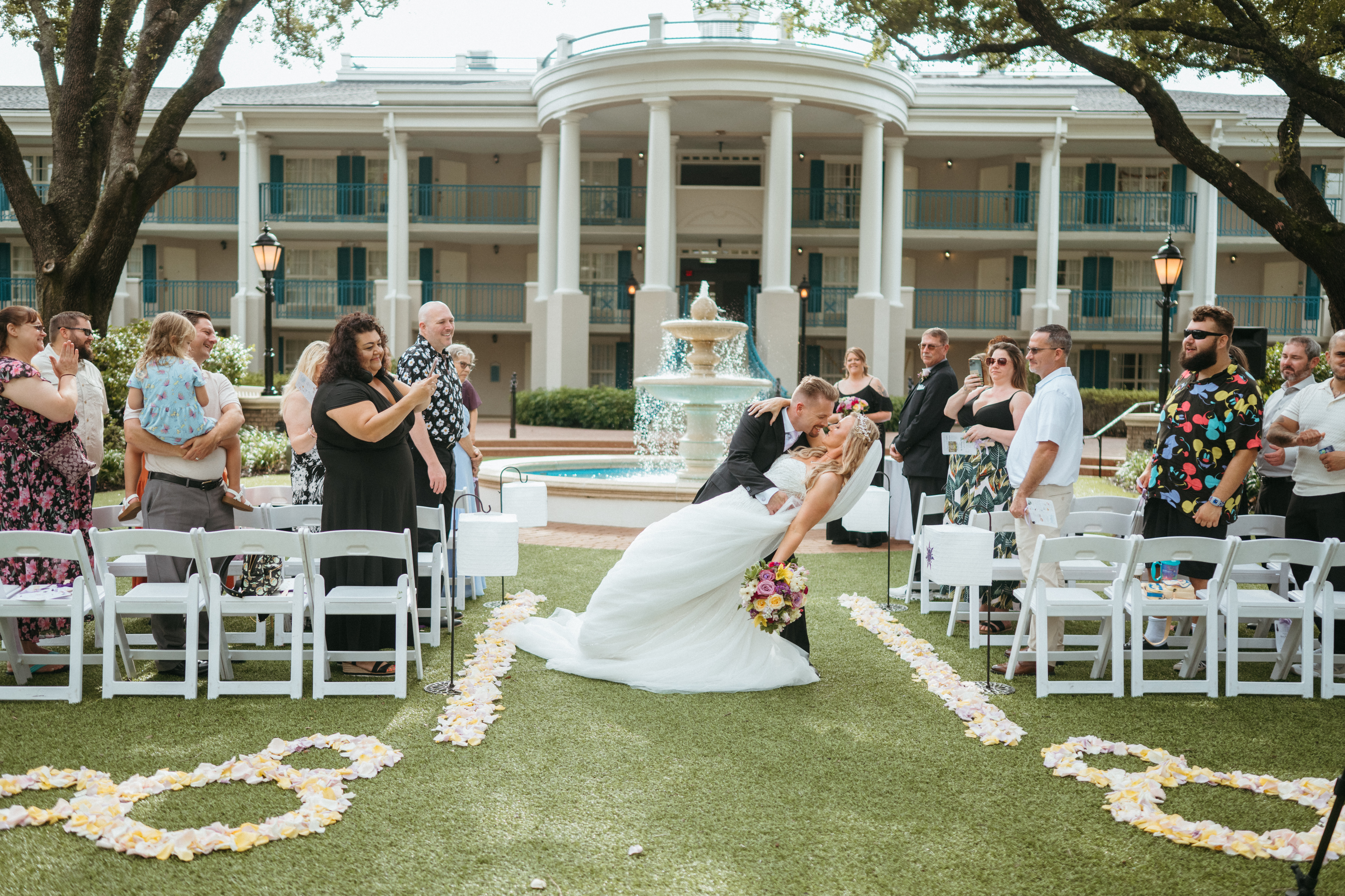 Room view with Gold Chiavari Chairs and Plum Chair Pads provided by A Chair Affair.