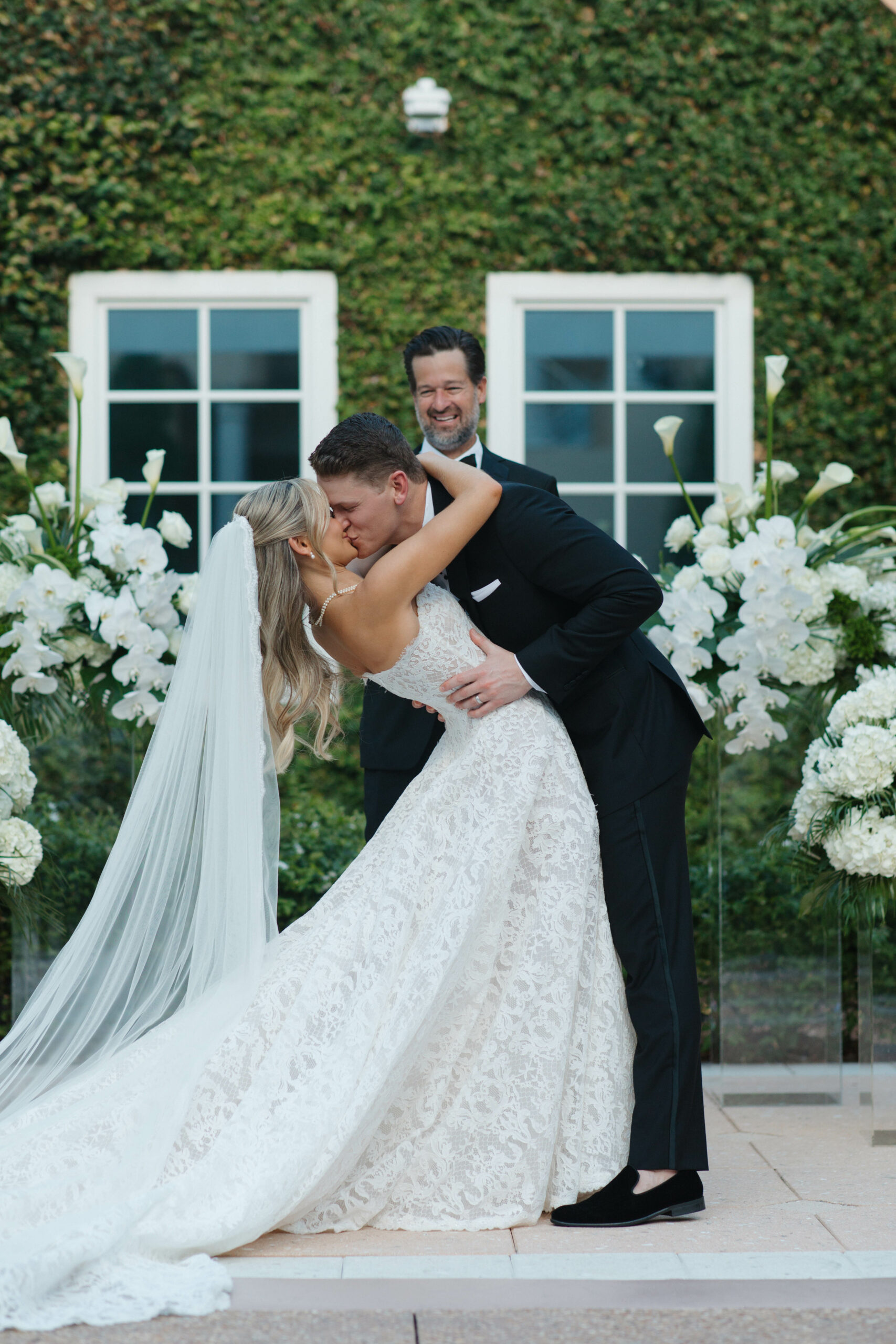 Bride and Groom kissing after ceremony. Orlando Wedding Rentals.