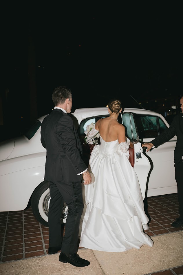 Bride and Groom leaving reception at MFA