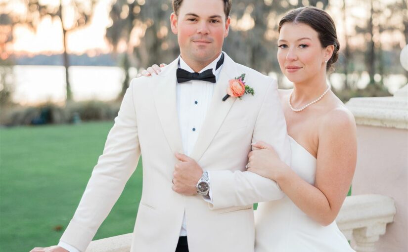 Bride and Groom posed at Isleworth Country Club. Tampa Bay Wedding. Tampa Bay Wedding Rentals. Florida Weddings. Florida Wedding Rentals.
