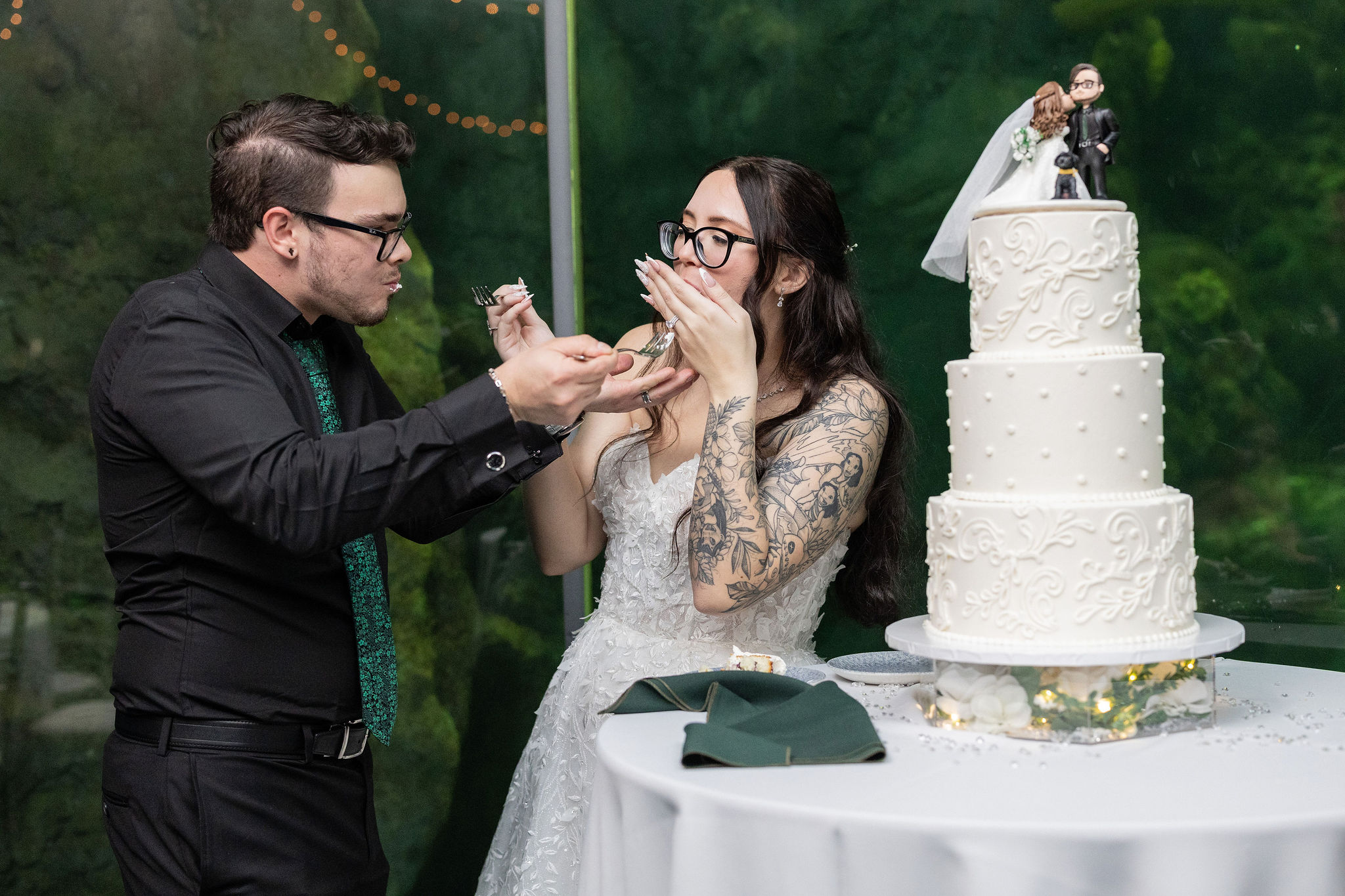 Bride and Groom eating cake