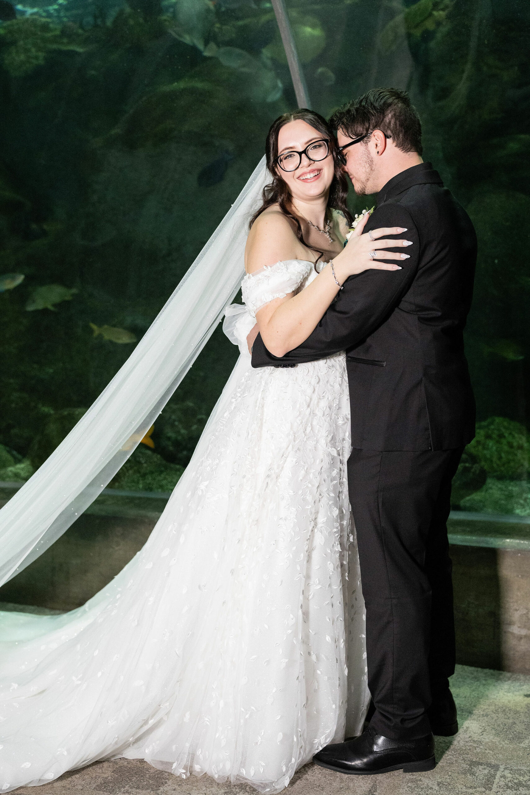 Bride and Groom posing at Florida Aquarium in Tampa
