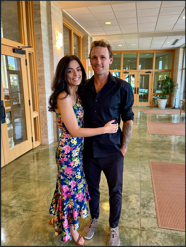 Bride and Groom to be hugging. May Monthly Wedding Winners 2026. Tampa Wedding Rentals. Orlando Wedding Rentals. Orlando Weddings. Orlando Chair Rentals. Tampa Chair Rentals.