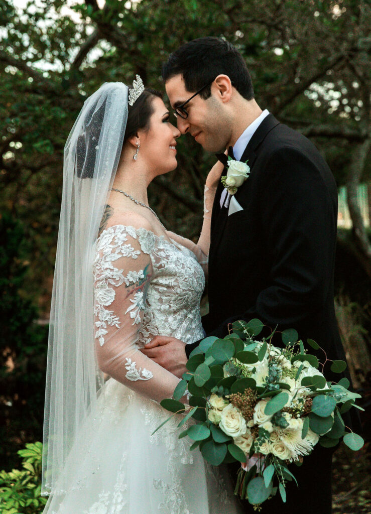 Bride and Groom gazing at each other at The Rosen Plaza with rentals provided by A Chair Affair. Orlando Weddings. Orlando Wedding Rentals. Orlando Chair Rentals. Chair Rentals Orlando. Chiavari Rentals Orlando. Central Florida Wedding Rentals.