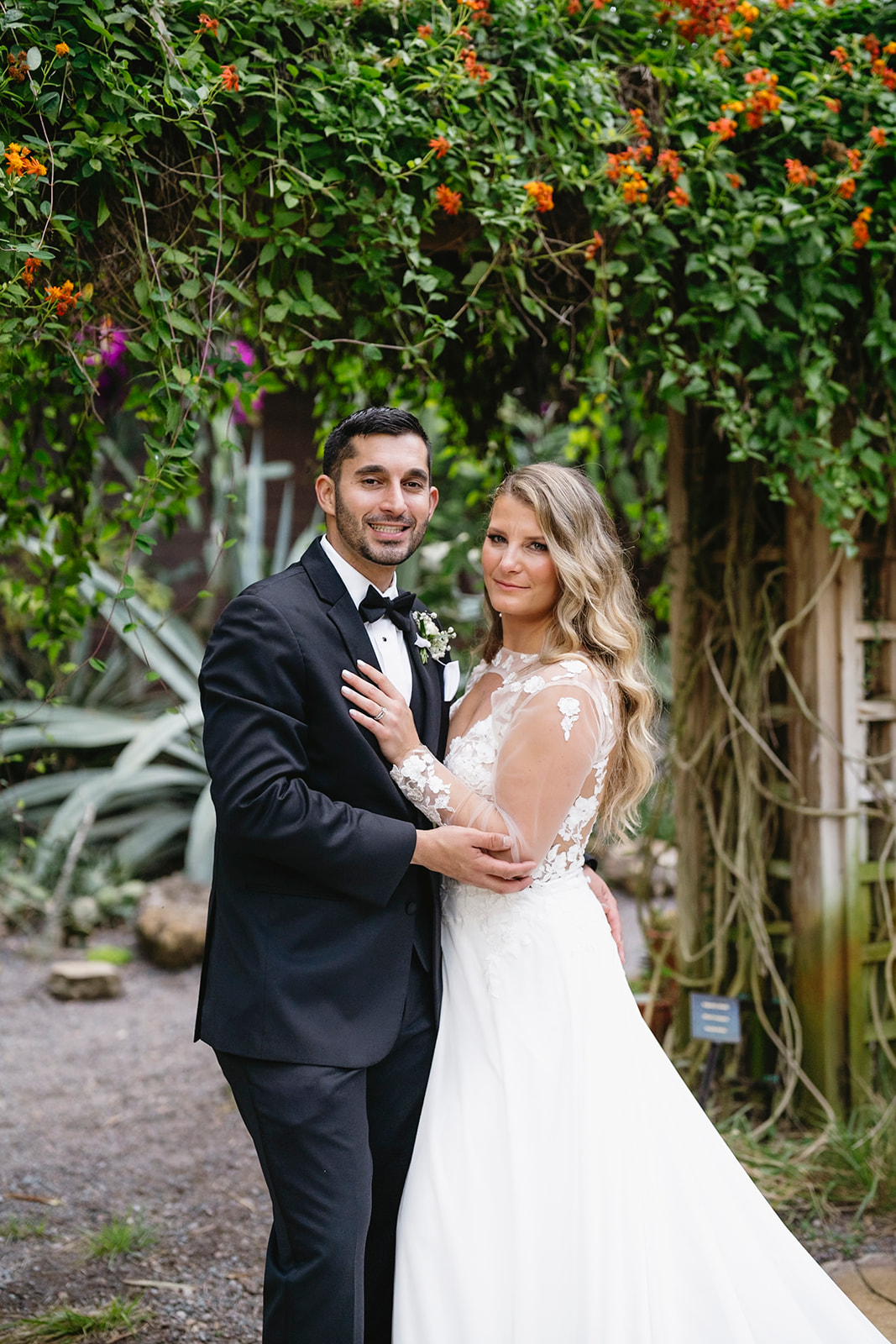 Bride and Groom at Sunken Gardens. St Petersburg Weddings. St Petersburg Wedding Rentals. Tampa Weddings. Tampa Wedding Rentals. Wedding Rentals Tampa. Chiavari Rentals Tampa. Chiavari Rentals Central Florida. Charger Rentals Tampa. Charger Rentals Central Florida. Rentals provided by A Chair Affair