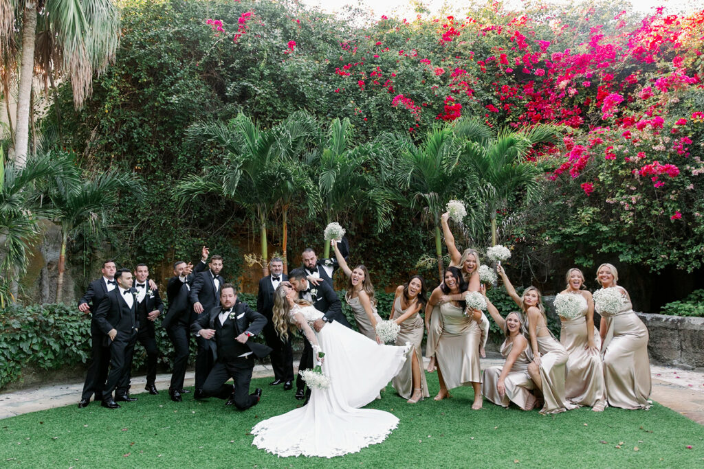 Entire bridal party at Sunken Gardens. St Petersburg Weddings. St Petersburg Wedding Rentals. Tampa Weddings. Tampa Wedding Rentals. Wedding Rentals Tampa. Chiavari Rentals Tampa. Chiavari Rentals Central Florida. Charger Rentals Tampa. Charger Rentals Central Florida. Rentals provided by A Chair Affair