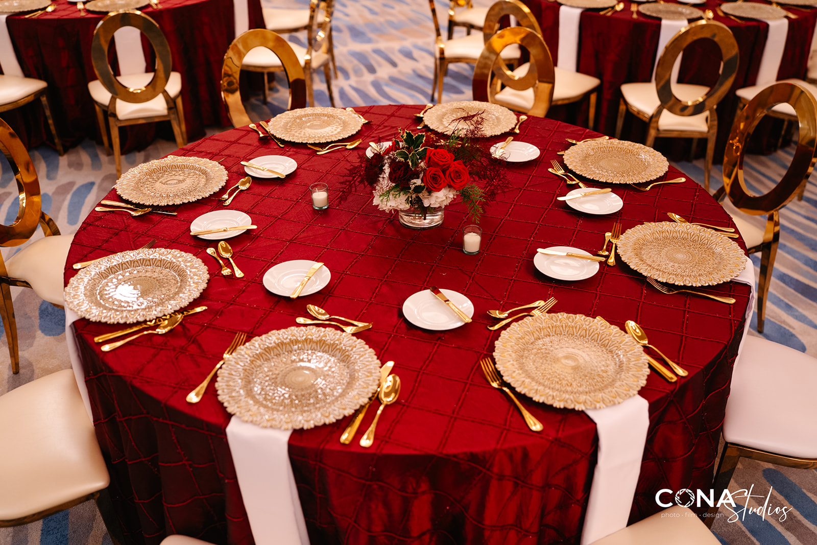 Table Overview with Gold and White Petal Chargers, Gold Oscar Chairs, Grace Etched Amber Water Goblets, Euro Gold Flatware provided by A Chair Affair. Euro Gold Flatware and Gold and White Petal Chargers from A Chair Affair. Central Florida Weddings. Orlando Weddings. Orlando Events. Central Florida Rentals. Charger Rentals Orlando. Chair Rentals Orlando. Flatware Rentals Orlando.