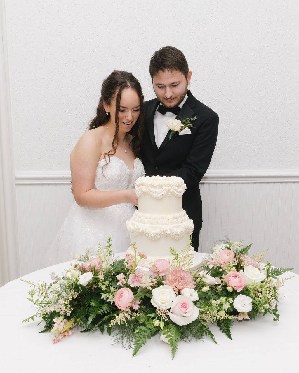 Bride and Groom cutting cake