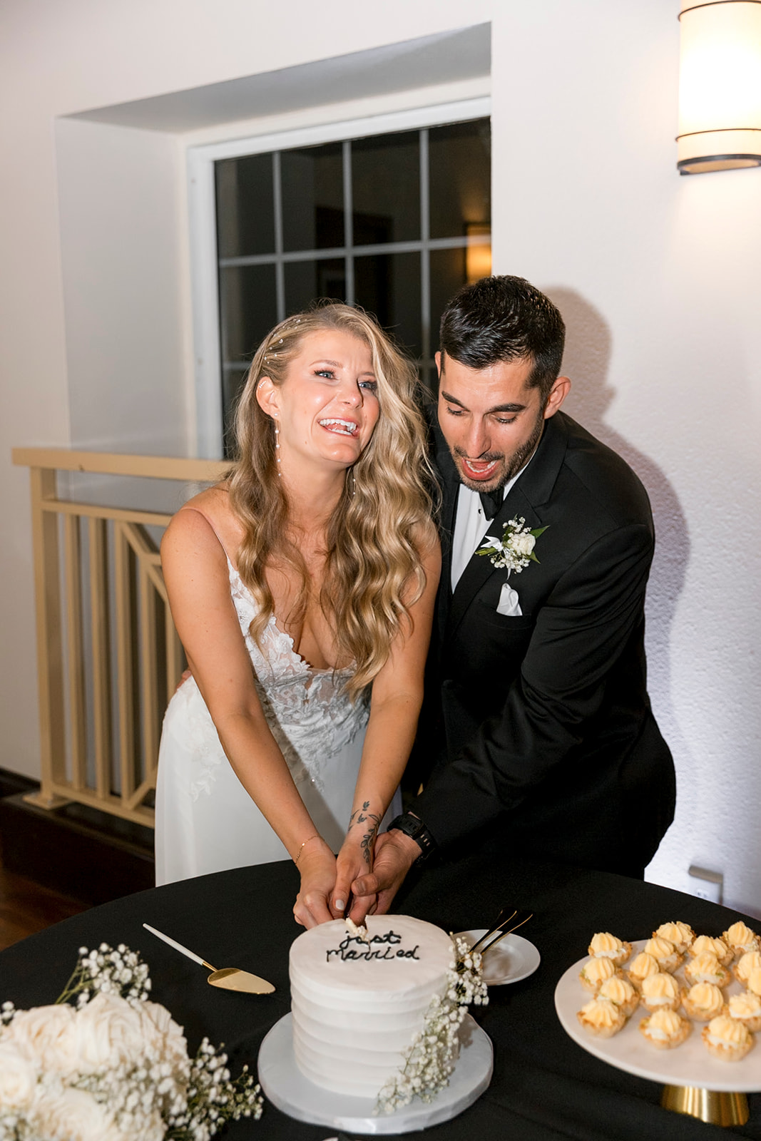 Bride and Groom cutting the cake