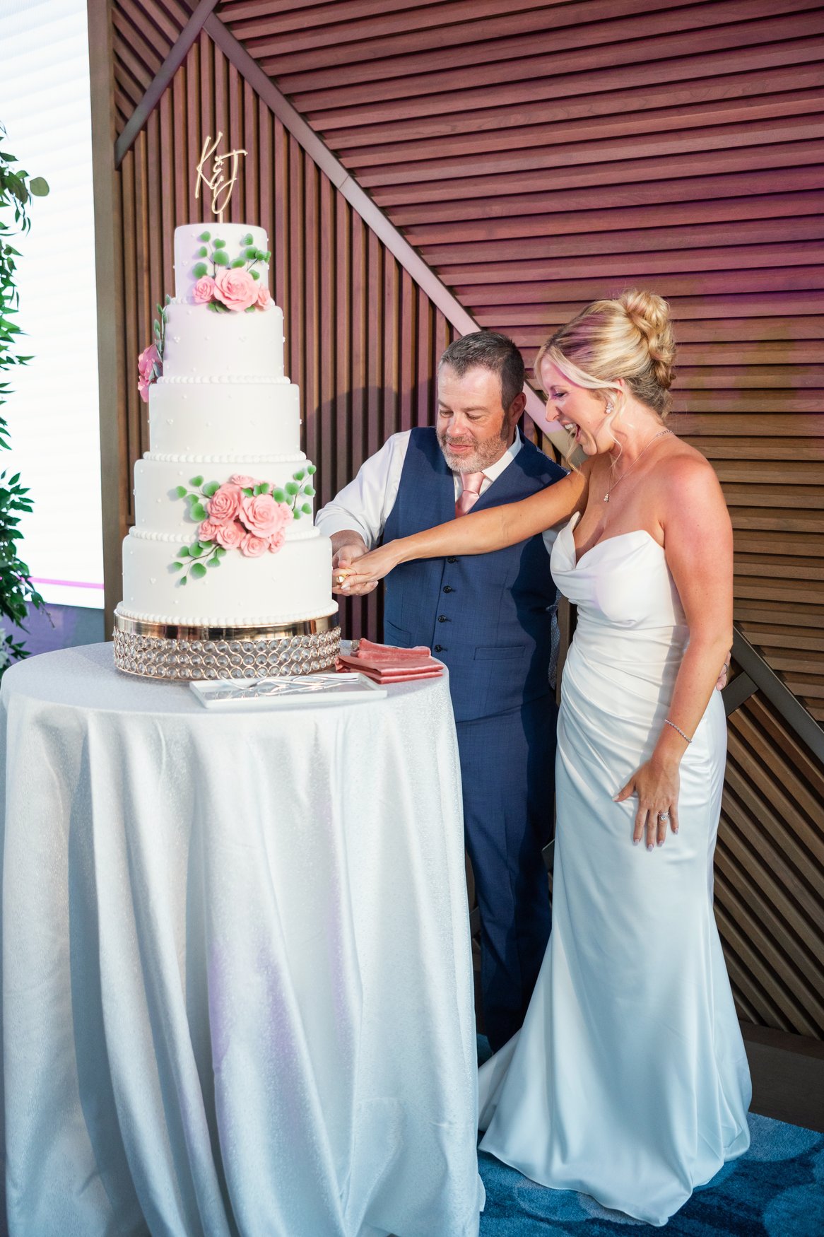 Bride and Groom cutting the cake
