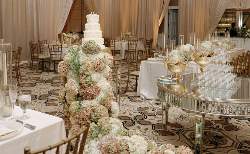 Floral Centerpiece flowing through the center of the room. Country Club of Orlando. Orlando Wedding Rentals. Central Florida Wedding Rentals. Orlando Table Rentals. Central Florida Table Rentals.