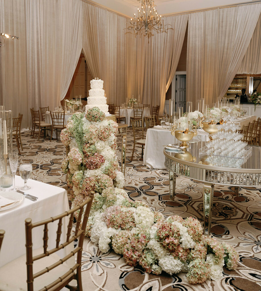 Floral Centerpiece flowing through the center of the room. Country Club of Orlando. Orlando Wedding Rentals. Central Florida Wedding Rentals. Orlando Table Rentals. Central Florida Table Rentals.