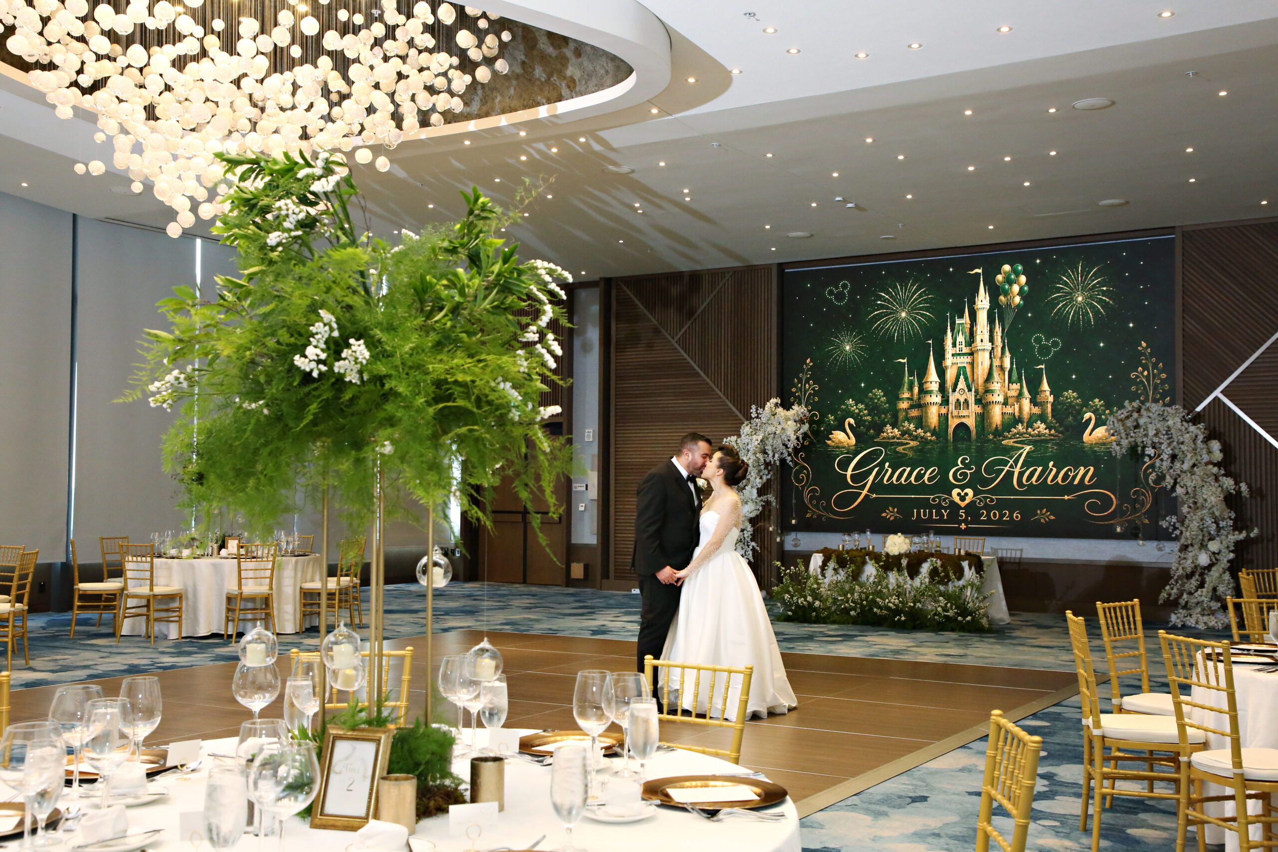 Bride and Groom kissing on dancefloor at Swan and Dolphin Resort's The Vue Ballroom